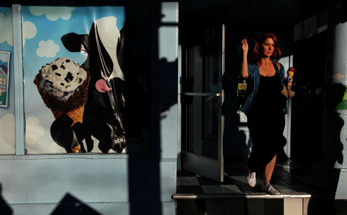 Suzanne Kissinger of San Francisco exits Ben & Jerry’s ice cream shop on Haight Street on Nov. 8, 2014. Kissinger is a baker and prefers to use alcohol in lieu of sugar in her recipes.