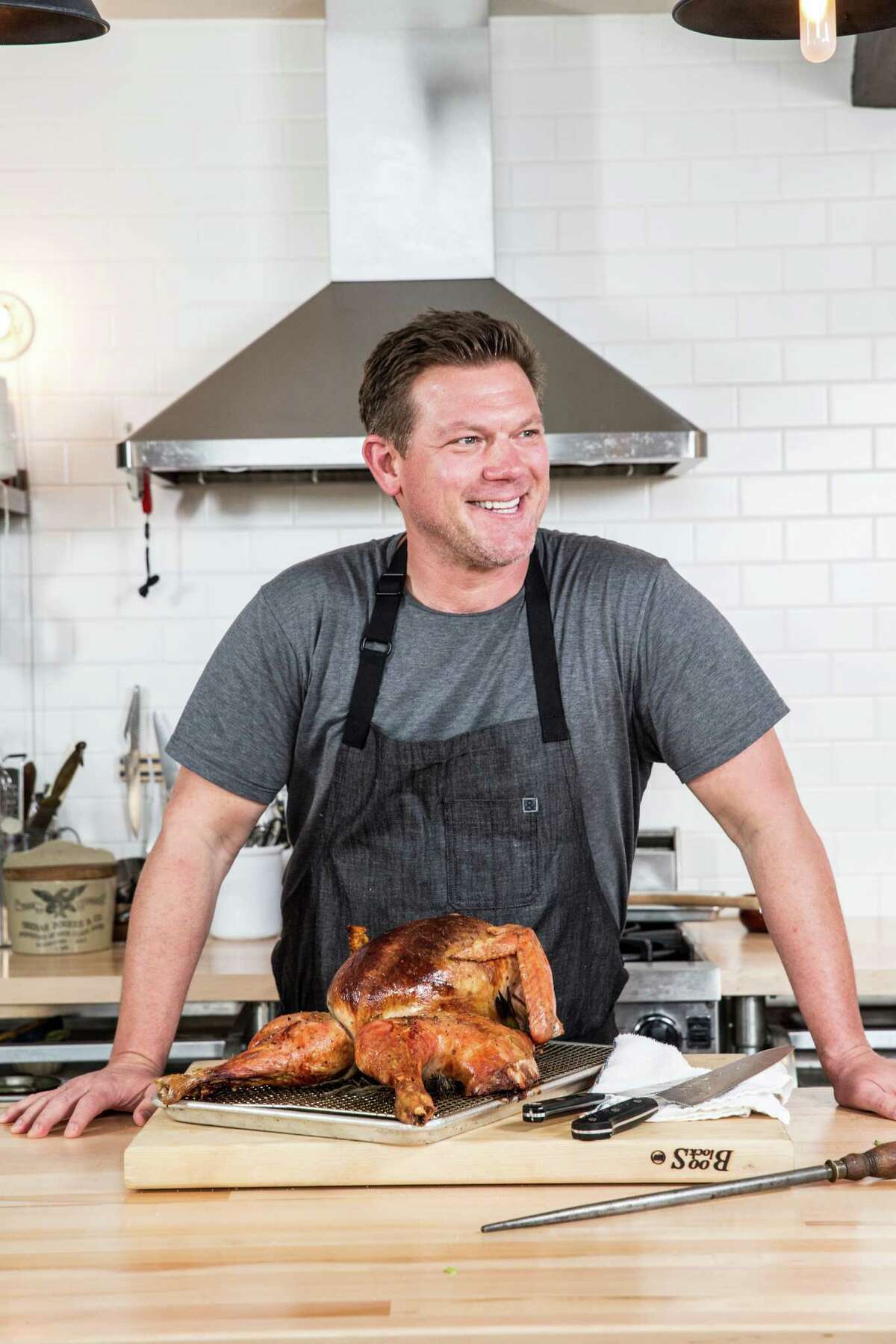 Tyler Florence with a just-roasted turkey.
