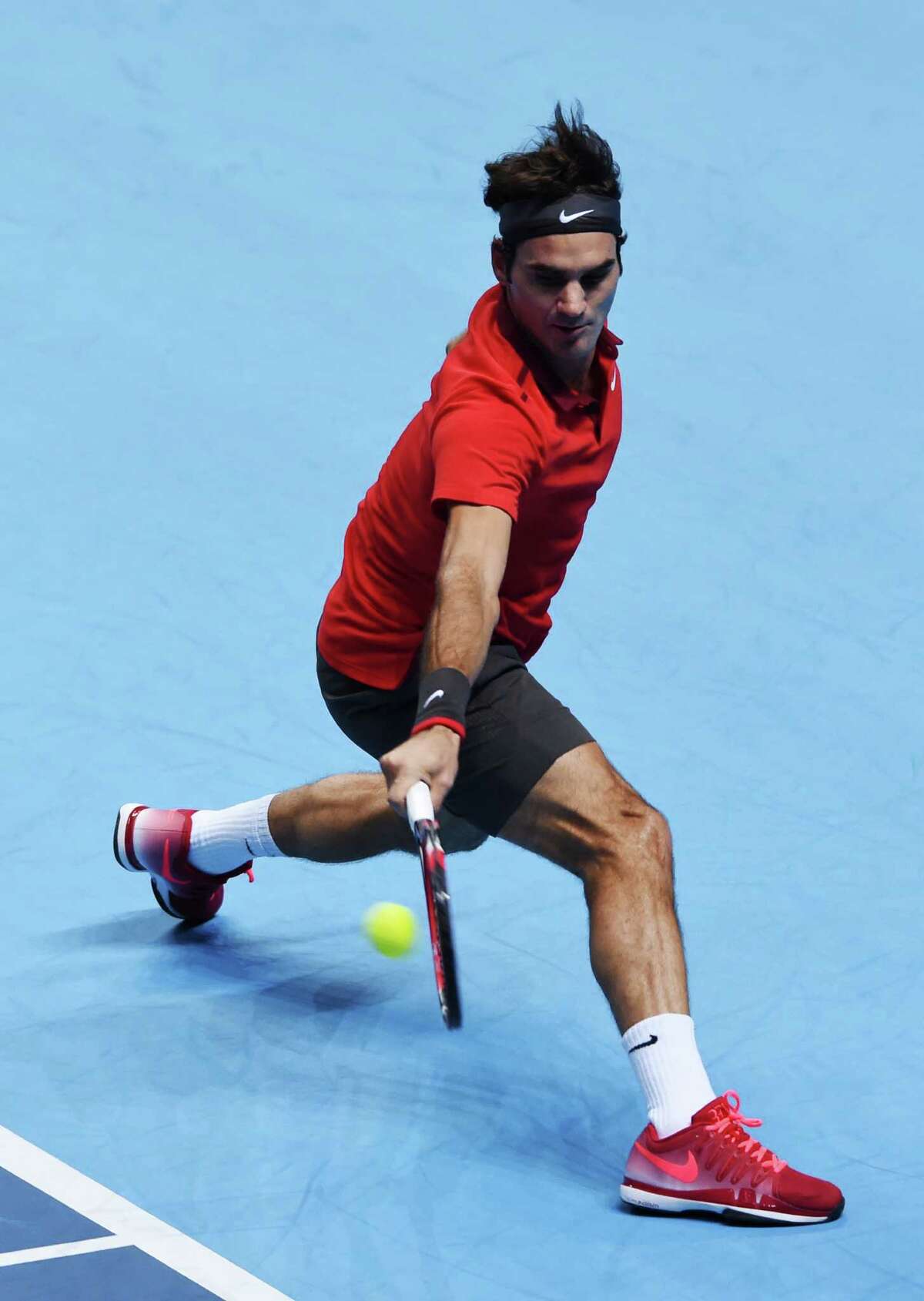 Roger Federer chases down a shot during his victory over Kei Nishikori on Tuesday.
