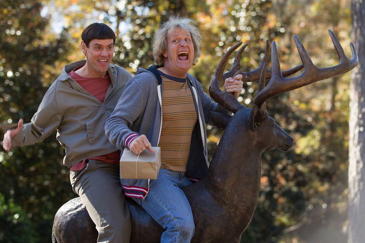 This image released by Universal Pictures shows Jim Carrey, left, and Jeff Daniels in a scene from "Dumb and Dumber To." (AP Photo/Universal Pictures, Hopper Stone)