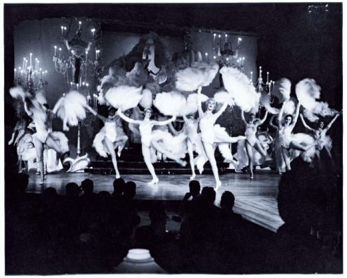 The Monorail and Space Needle were not the only big attractions during Seattle's 1962 World’s Fair -- how about nudity and dancing women along Century 21’s Show Street? The nightclub-style revues included Girls of the Galaxy, featuring models posing in revealing space-age costumes, and Gracie Hansen’s Paradise International Club, which provided Las Vegas-style entertainment with showgirls. (MOHAI photo.)