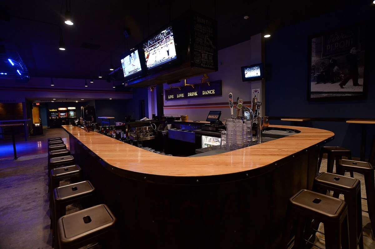Bar Local's main bar is constructed of pieces from the former Pacesetter's dance floor. Kim Brent/@kimbpix