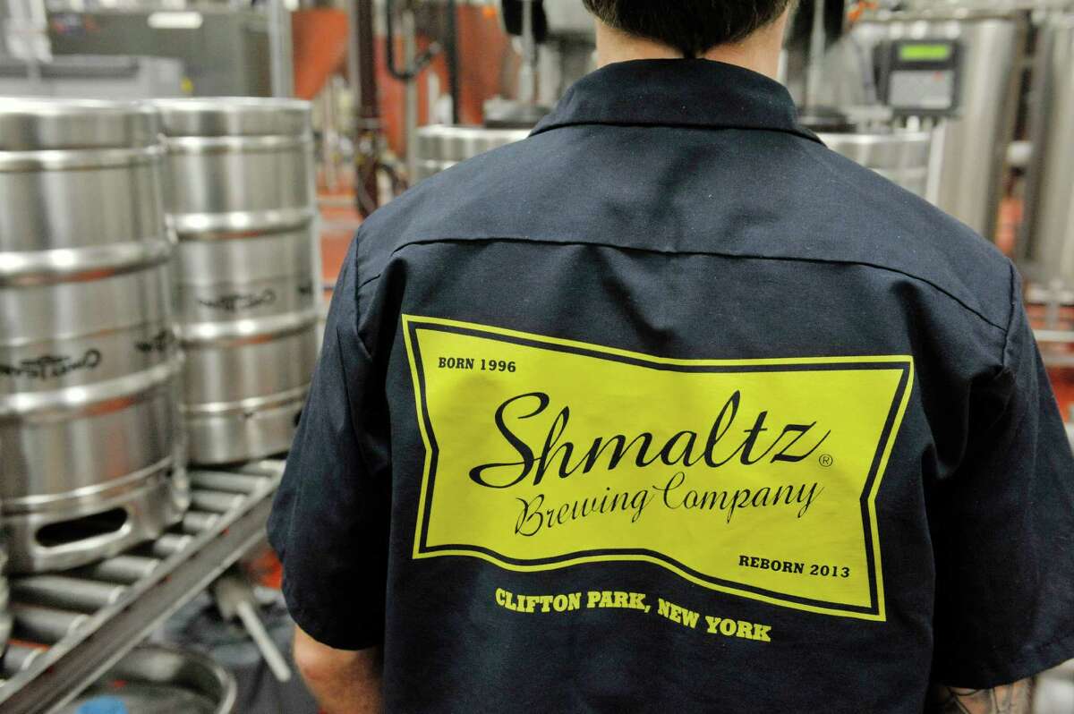 Josh Pultorak works filling kegs at the Shmaltz Brewing Company on Thursday, Nov. 13, 2014, in Clifton Park, N.Y. (Paul Buckowski / Times Union)