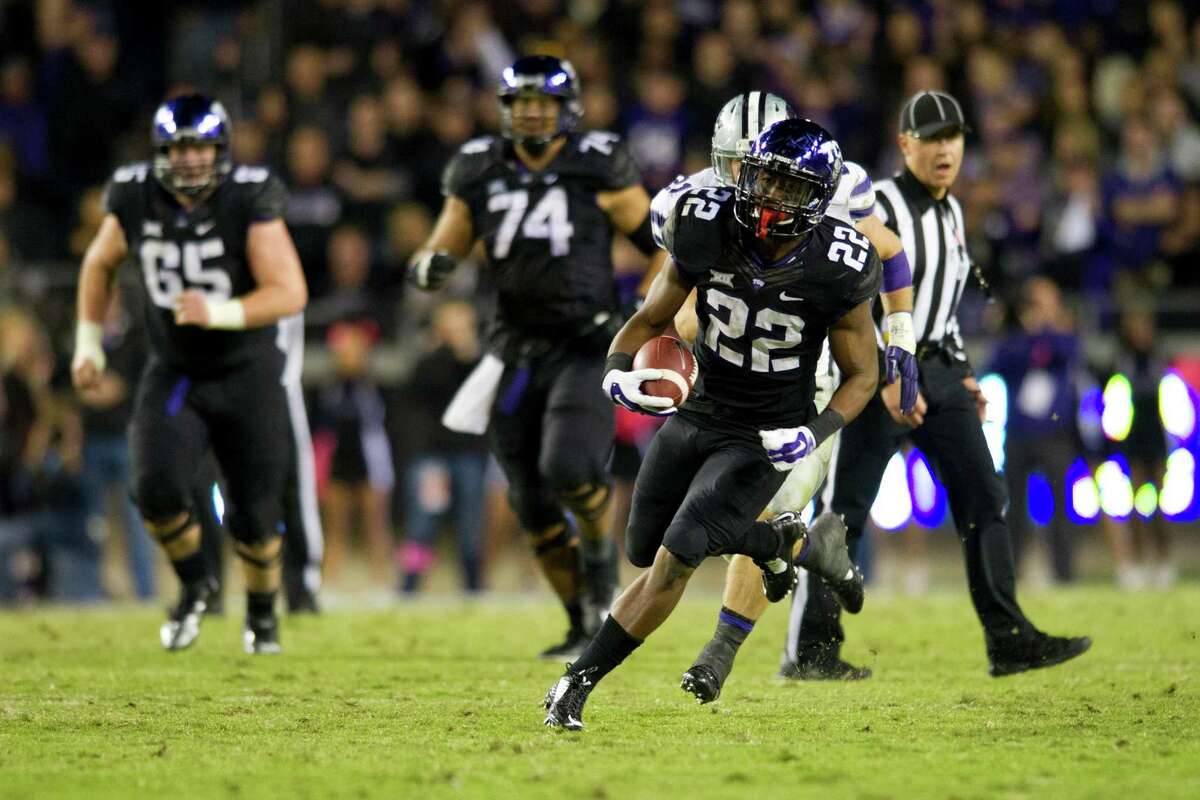 TCU’s Aaron Green, of local Madison High School, breaks free against the Kansas State Wildcats during the 3rd quarter on November 8.