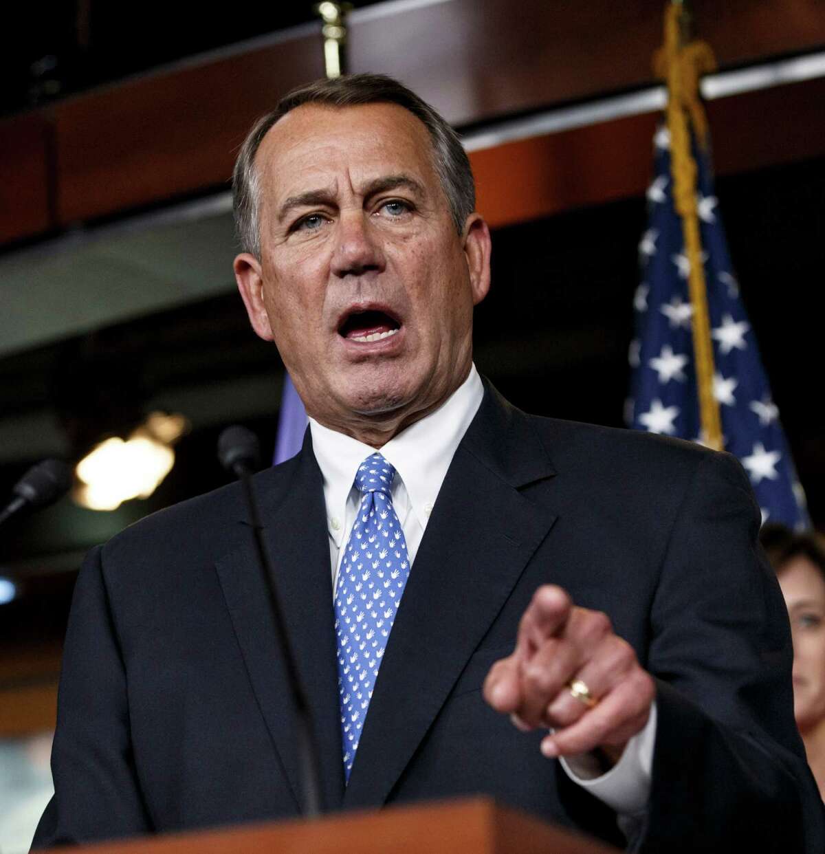 House Speaker John Boehner is considering a suit against the president and won't rule out a government shutdown.
