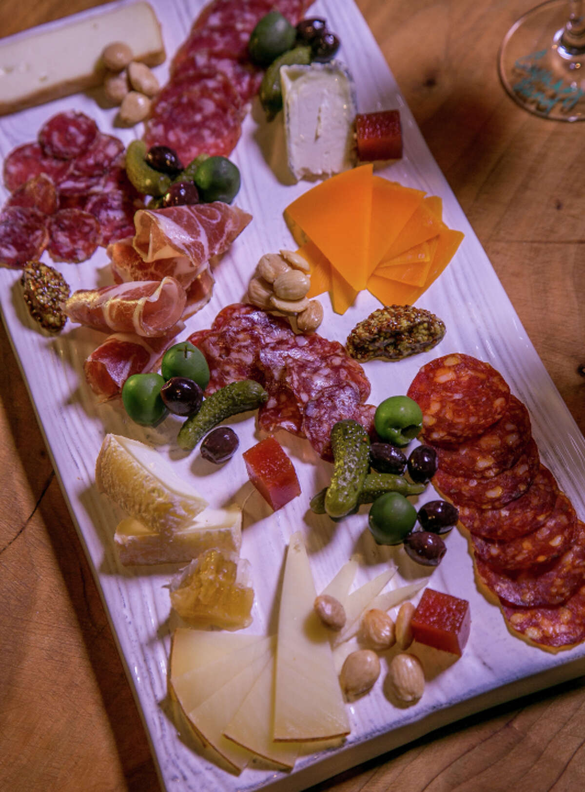 The charcuterie plate at Les Clos comes in a striking presentation, with the meats changing regularly.