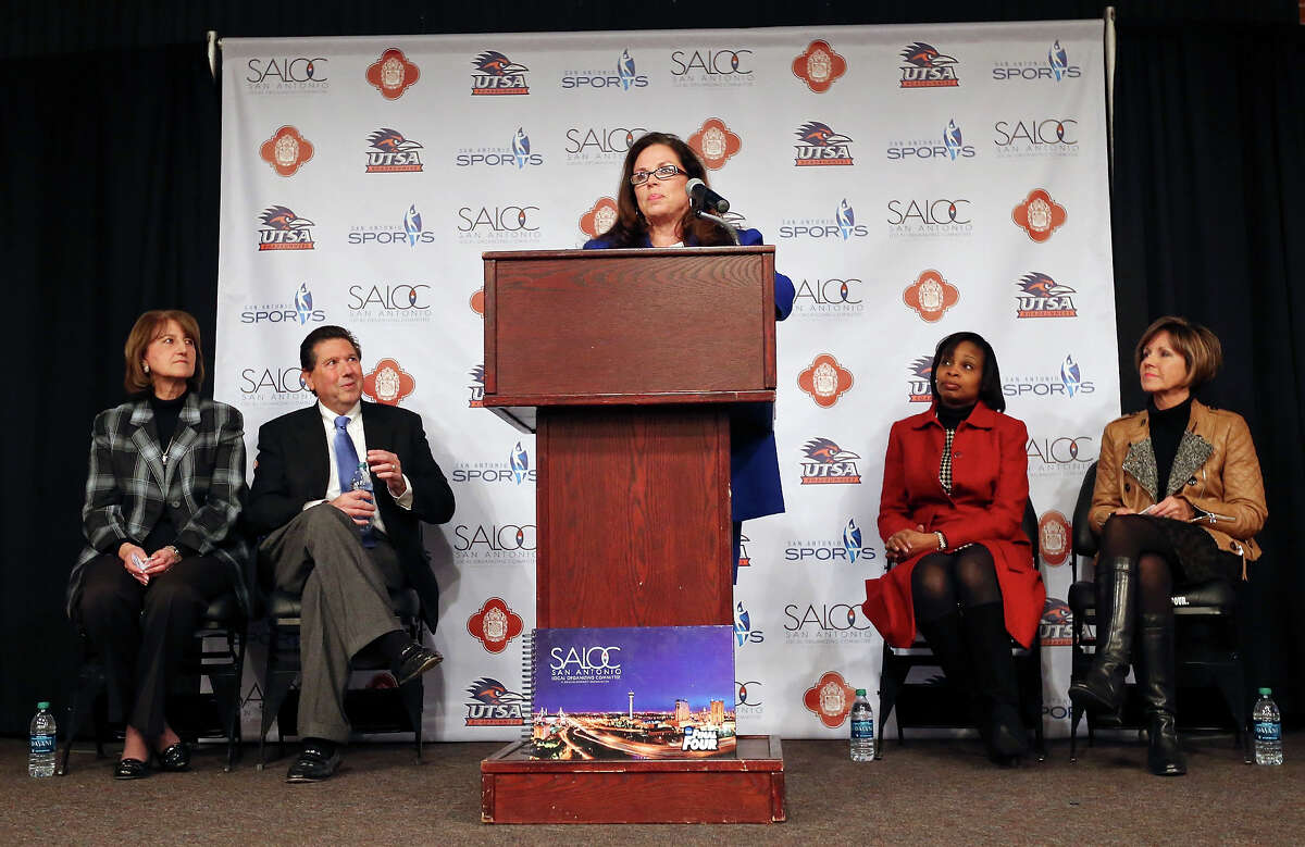San Antonio Sports Associate Executive Director Mary Ullmann Japhet (center) speaks during a press conference Friday Nov. 14, 2014 at Aldaco's in Sunset Station as UTSA Athletic Director Lynn Hickey (from left), San Antonio Sports President & CEO Russ Bookbinder, Mayor Ivy R. Taylor, and San Antonio City Manager Sheryl Sculley listen. San Antonio will be the site for the 2018 NCAA Men?•s Final Four.