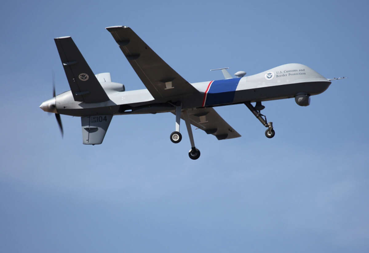 A drone patrols the U.S. border. An aircraft was used for surveillance in the Yee-Chow FBI probe.