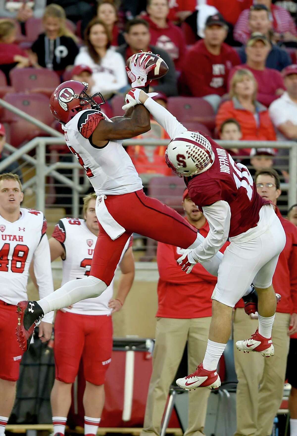 PALO ALTO, CA - NOVEMBER 15: Kenneth Scott #2 of the Utah Utes catches a 32 yard pass over Zach Hoffpauir #10 of the Stanford Cardinal in the second quarter at Stanford Stadium on November 15, 2014 in Palo Alto, California. (Photo by Thearon W. Henderson/Getty Images)
