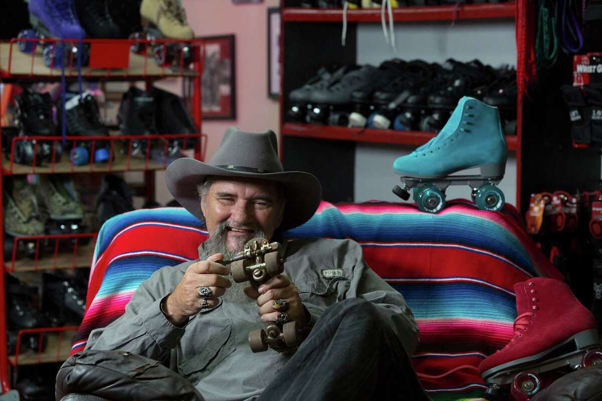 John McKay, holding a vintage clamp-on skate, says his passion for skating has allowed his niche business to survive.