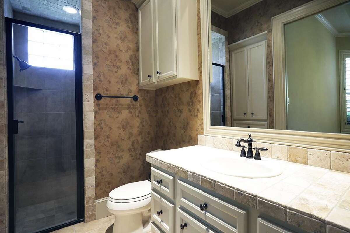 1,696,300 Woodlands home in foreclosure