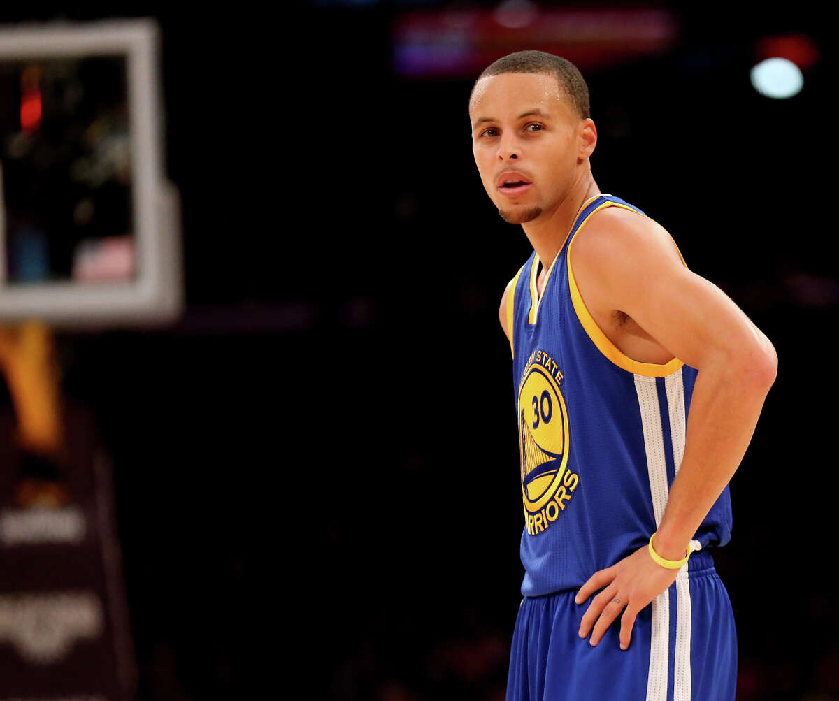 Against the Lakers on Sunday night, Warriors guard Stephen Curry got his teammates involved, then took over the game.