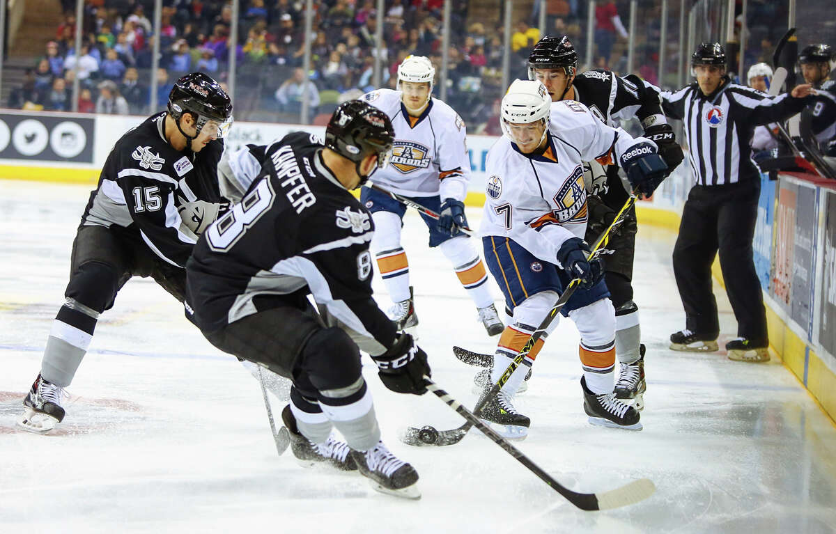 Rampage defenseman Steven Kampfer (right in a file photo from November) was called for a key match penalty against the Barons in a loss at the AT&T Center on Dec. 27, 2014.