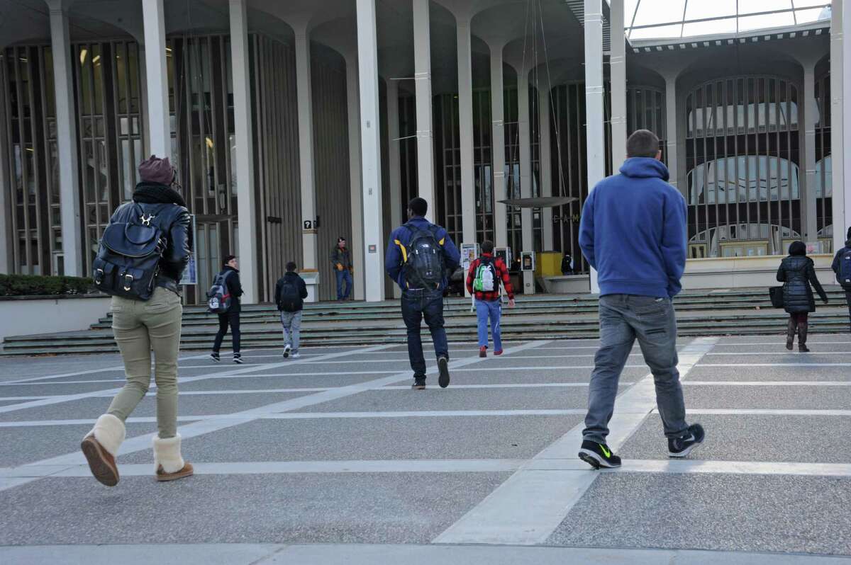 Students walk from class at UAlbany on Tuesday, Nov. 18, 2014 in Albany, N.Y. (Lori Van Buren / Times Union)