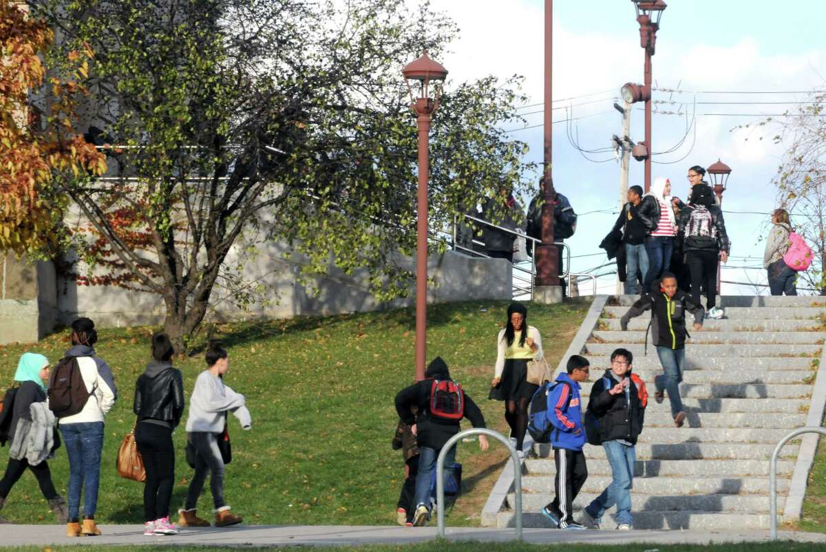 William S. Hackett Middle School students exit the school at the end of the day Tuesday afternoon, Nov. 18, 2014, in Albany, N.Y. (Michael P. Farrell/Times Union)