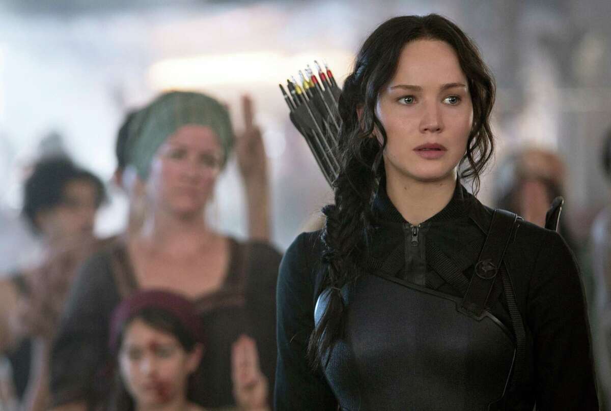 Katniss Everdeen (Jennifer Lawrence) visits a hospital in District 8 in a scene from "The Hunger Games: Mockingjay, Part 1."