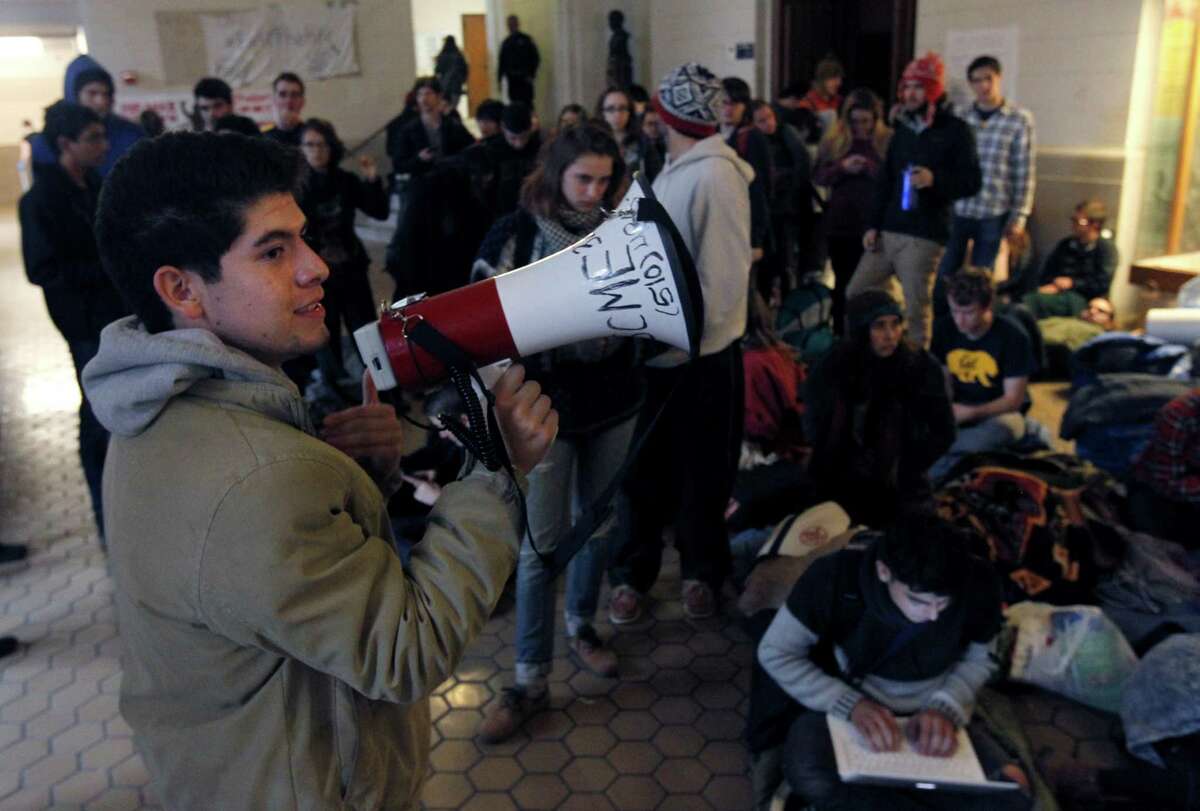 Students occupy Wheeler Hall at UC Berkeley on Thursday, Nov. 20, 2014 to oppose a 5% tuition increase approved by a University of California Board of Regents committee Wednesday. The full board is expected to pass the increase Thursday.
