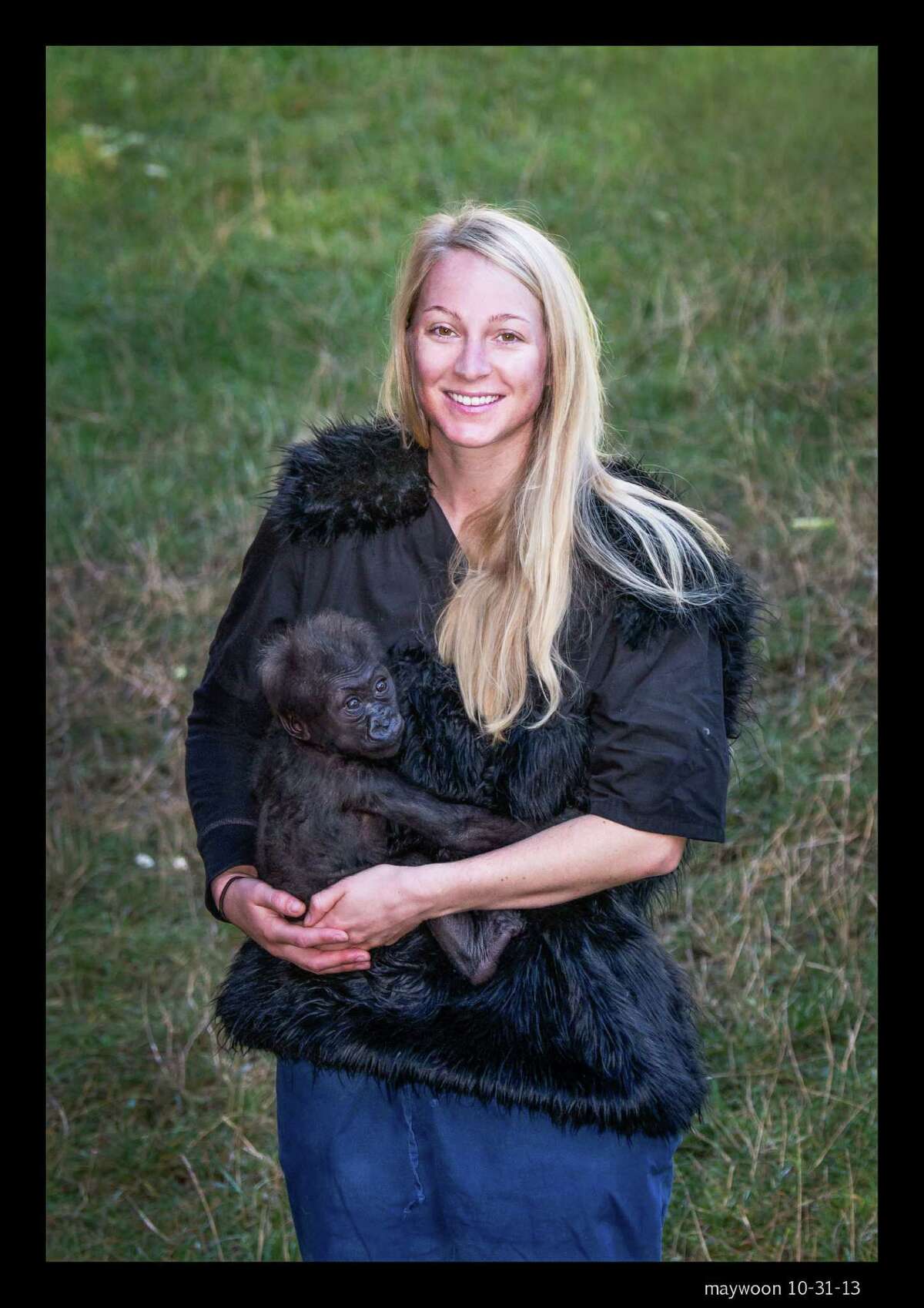 Animal keeper Kelly Blakemore plays with infant gorilla Kabibe at the San Francisco Zoo gorilla preserve on Oct. 31, 2013. Kabibe died in a tragic accident at the zoo earlier this month.