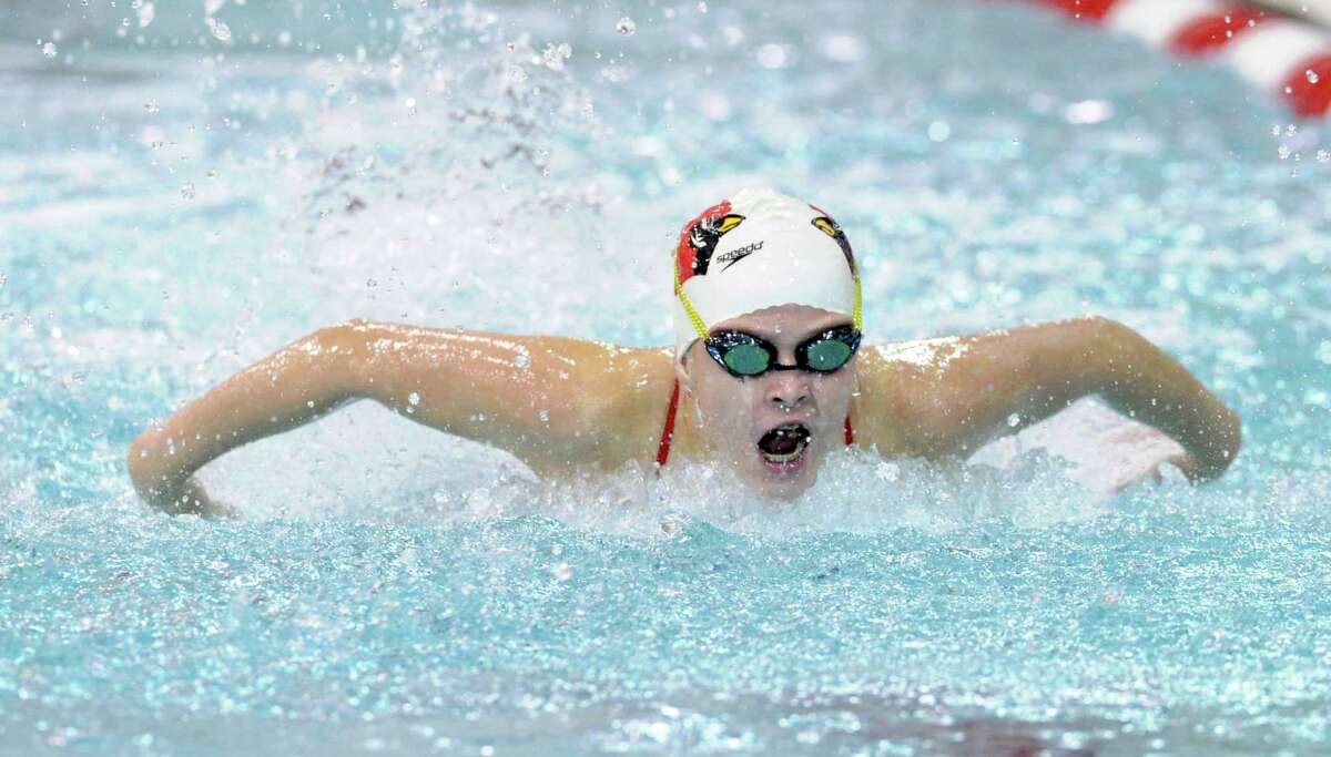 Kelly Montesi of Greenwich competes in the 100 butterfly event during the FCIAC Girls High School Swimming Championship at Greenwich High School on Oct. 30.