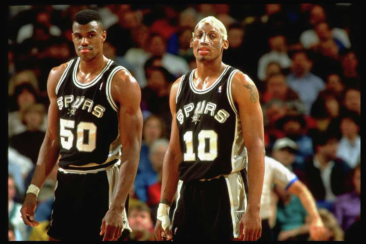 Dennis Rodman and David Robinson of the San Antonio Spurs are seen in a photo of when they played together for years in the 1990s. Recently, Robinson said had a hard time figuring out Rodman, one of the most erratic players in NBA history.