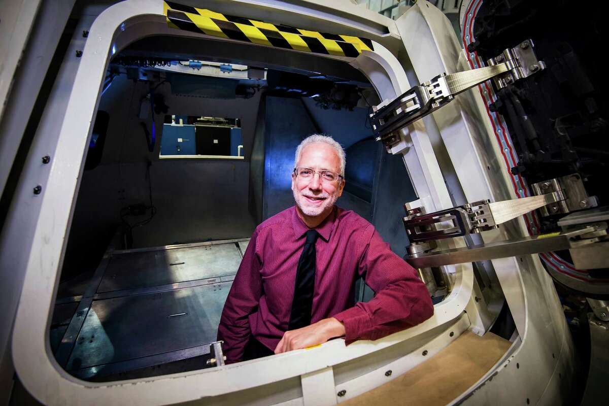 NASA Orion Program Manager Mark Geyer photographed in a mockup of the spacecraft at the NASA Johnson Space Center Thursday, March 27, 2014, in Houston.