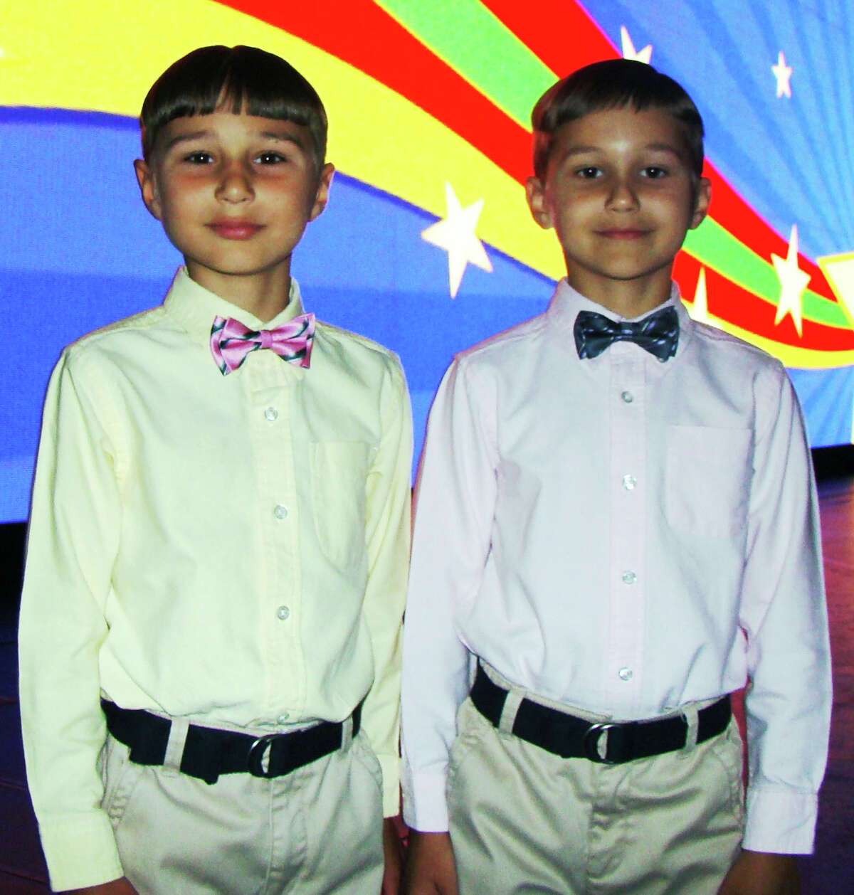 Brothers Ivan, 7, left, and Alex Kalamikov, 5, of New Milford, formerly of Staten Island, N.Y. 2014