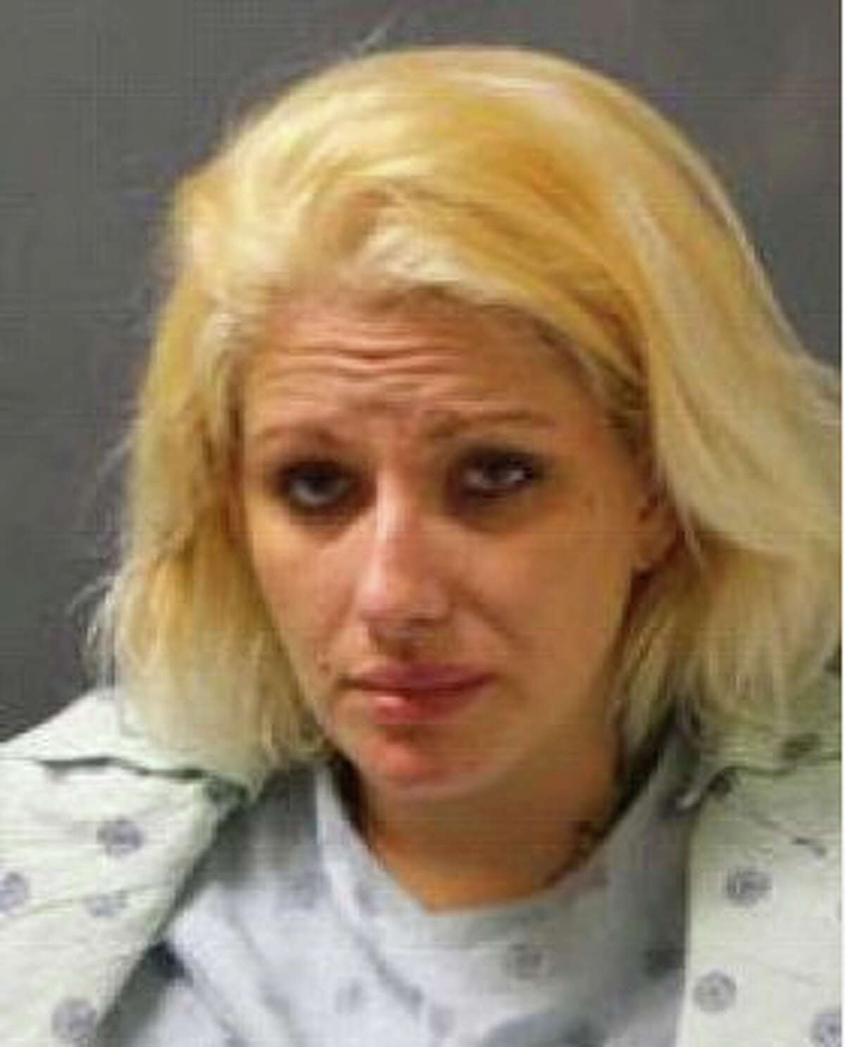 Kelly Jo Ivey, 29, who collided head-on with the deputy's patrol car, was charged with possession of methamphetamine as a result of the investigation into the crash.