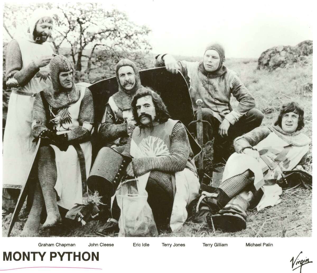 BRITISH COMEDY TROUPE, "MONTY PYTHON". GRAHAM CHAPMAN, JOHN CLEESE, ERIC IDLE, TERRY JONES, TERRY GILLAM, MICHAEL PALIN. from the set of the film MONTY PYTHON AND THE HOLY GRAIL. HOUCHRON CAPTION (01/16/2005) SECZEST: SETTING THE CINEMA BACK 900 YEARS: Graham Chapman, from left, John Cleese, Eric Idle, Terry Jones, Terry Gillam and Michael Palin on the set of the 1975 film Monty Python and the Holy Grail; 2. SPAM!: Hormel has created the limited-edition "golden honey grail" Spam flavor in honor of the musical Monty Python's Spamalot.