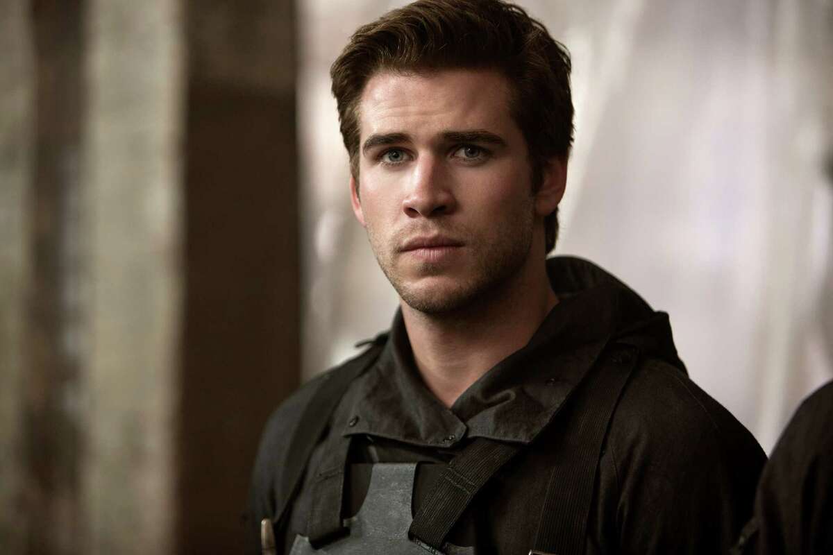 In this image released by Lionsgate, Liam Hemsworth portrays Gale Hawthorne in a scene from "The Hunger Games: Mockingjay Part 1." (AP Photo/Lionsgate, Murray Close)