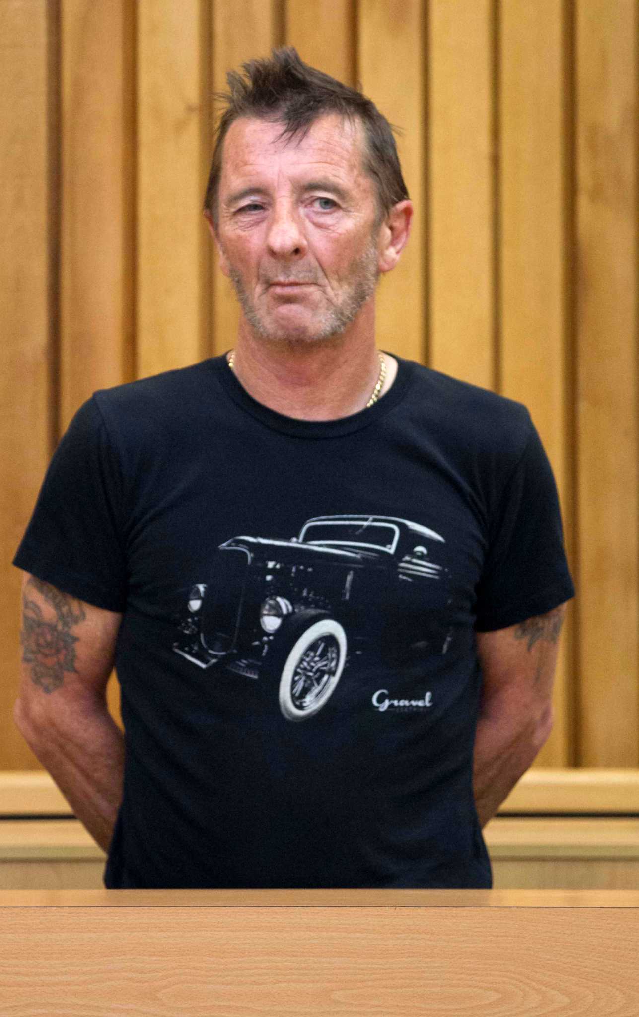 AC/DC drummer clowns around at New Zealand court