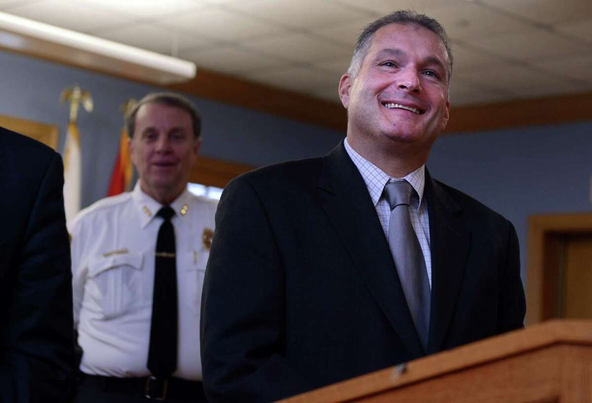 Michael Lombardi answers questions after being named the new police chief for Trumbull Wednesday, Nov. 26, 2014, during the announcement at Town Hall. Lombardi will replace Police Chief Thomas Kiely, who is retiring on Jan. 1, after 40 years of service with the force.