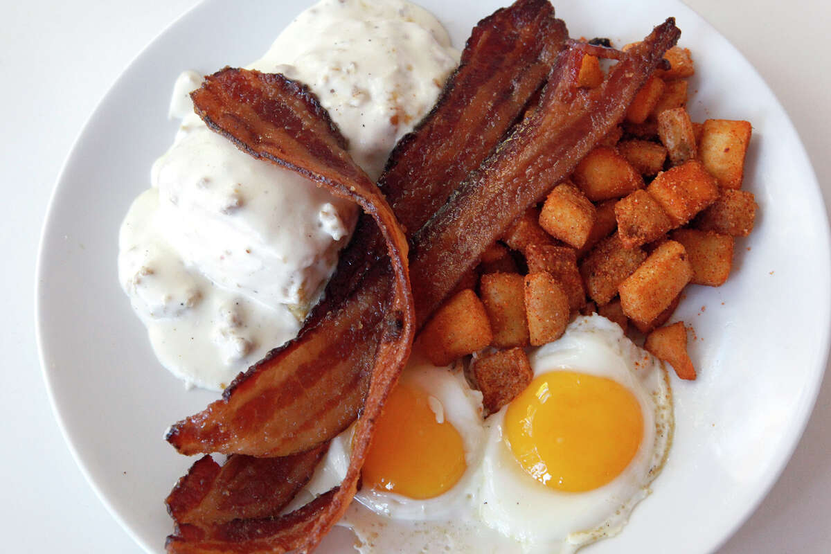 The WT is one of the best-selling dishes during brunch at Feast Restaurant on South Alamo Street. It features eggs, bacon, potatoes and biscuits and gravy.