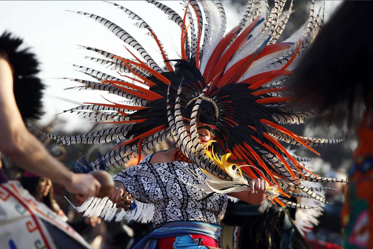 A participant dances at the Indigenous People's Sunrise Gathering on Alcatraz Island on November 27, 2014 in San Francisco, Calif.