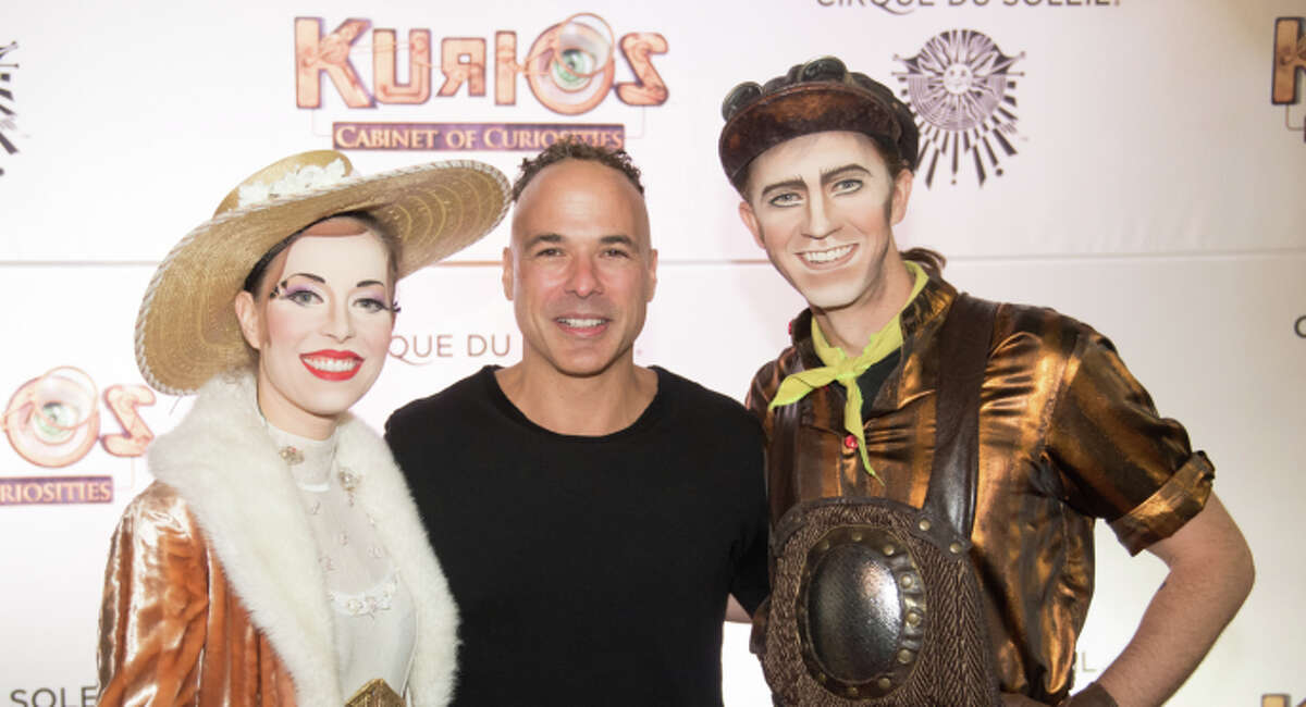 Left: Cirque du Soleil writer-director Michel Laprise (center) with performers Christa Mercey (left) and Kit Chatham at the U.S. premiere of “Kurios.” Right: