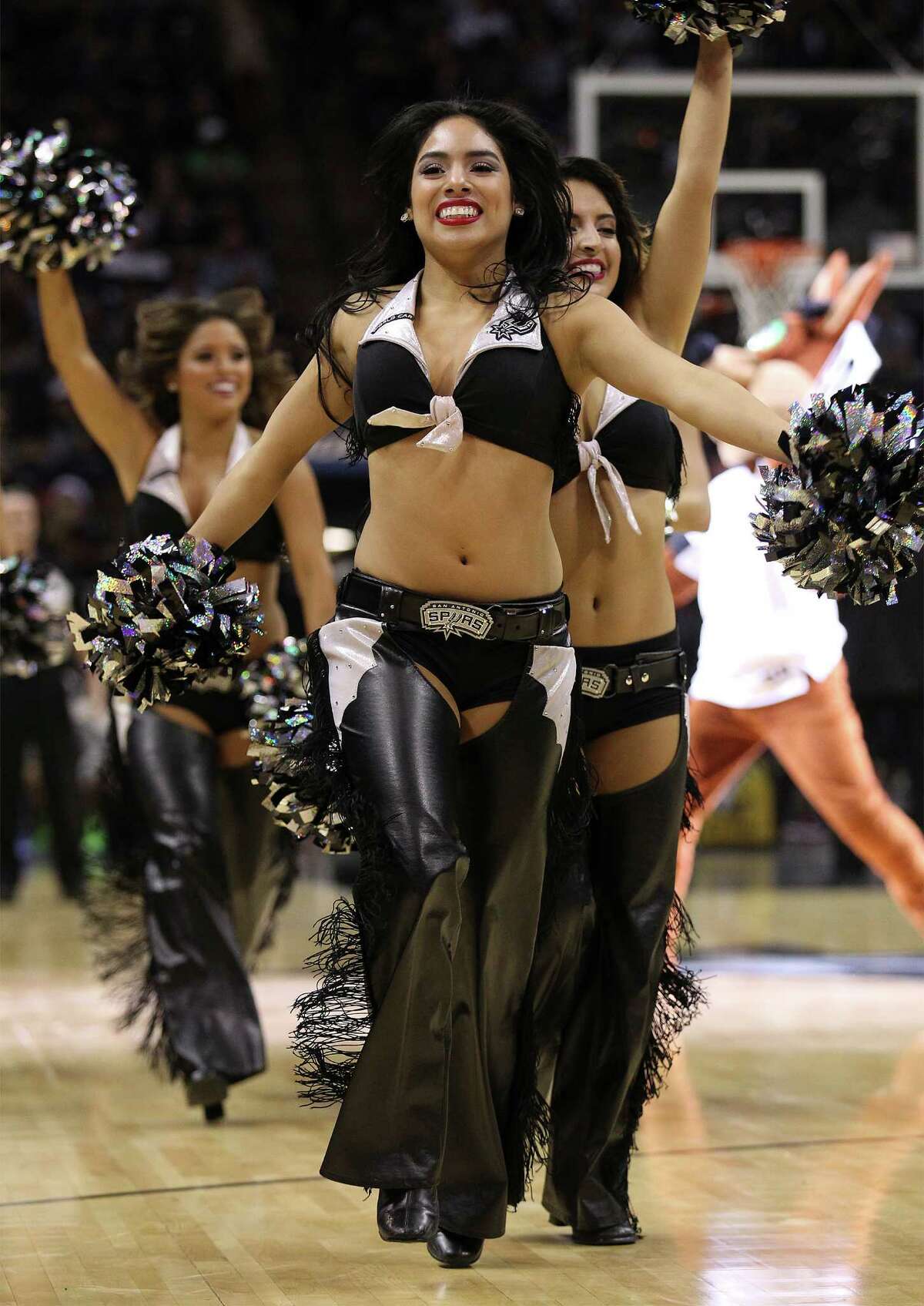 The Spurs' Silverdancers perform during a timeout in the game against the Sacramento Kings at the AT&T Center on Friday, Nov. 28, 2014. Spurs defeat the Kings 112-104. (Kin Man Hui/San Antonio Express-News)