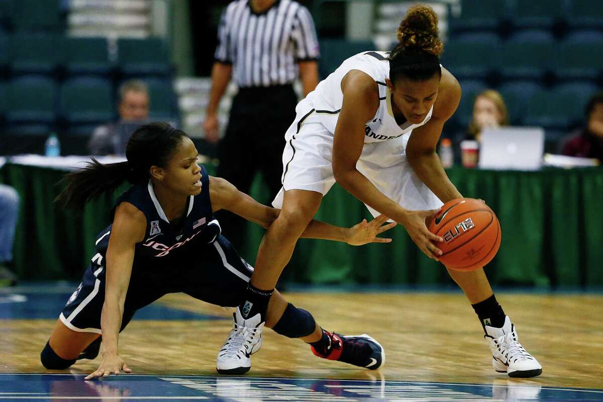 Connecticut's guard Moriah Jefferson, left, attacks after the ball from Vanderbilt's guard Paris Kea during the second half Saturday, Nov. 28, 2014 at Germain Arena in Estero, Fla. The University of Connecticut faced off against Vanderbilt in the Gulf Coast Showcase women's basketball tournament. UConn downed Vandy 91-52. Tomorrow the Huskies face the University of Wisconsin-Green Bay in the finals. (AP Photo/Naples Daily News, Corey Perrine) FORT MYERS OUT MAGS OUT