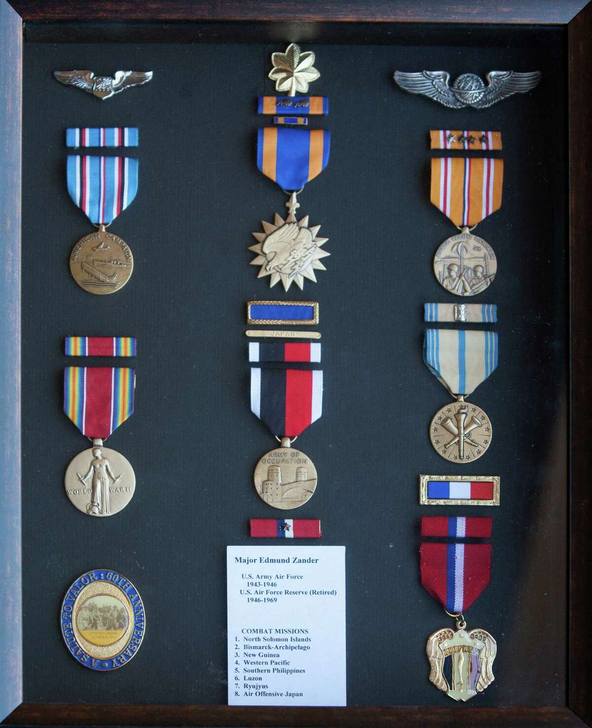 A shadow box hold Zander's medals. Retired Air Force Reserve Major Ed Zander recently got the medals he received during World War II replaced by Randolph Air Force Base in San Antonio. Zander was a navigator in the Pacific during the war. Zander lives with his wife Betty in Plano Texas. Photo by Mark Rogers