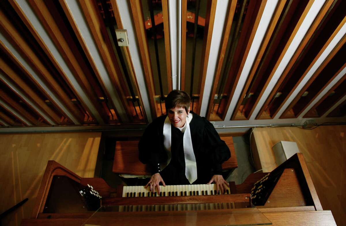Ann Frohbieter at the organ of Temple Emanu El.