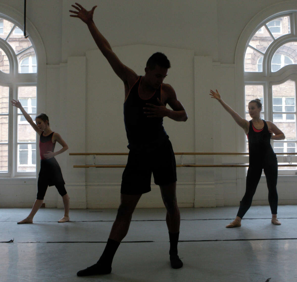 Rachel Furst (left), Isaiah Bindel and Jordan Drew rehearse their performance for Gregory Dawson in the Alonzo King Lines Ballet Dance Center in San Francisco.