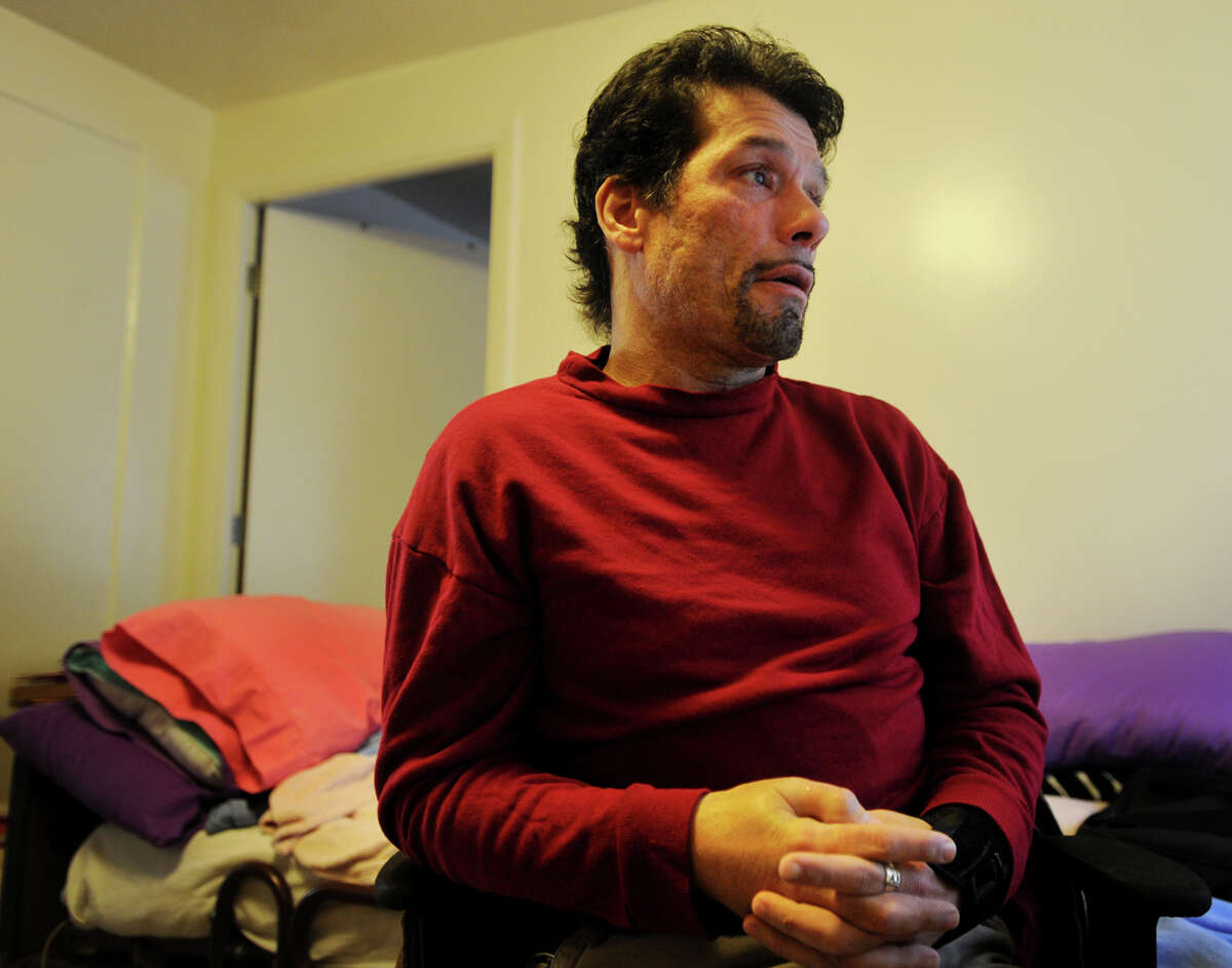 Martin Chalecki, in his apartment at the Marina Village housing project in Bridgeport, Conn. on Thursday, December 4, 2014, claims he was molested by Gonzalo Flores while a patient at St. Vincent's Medical Center. Chalecki said he reported the molestation to the hospital at the time, but that his charges were dismissed by hospital authorities.