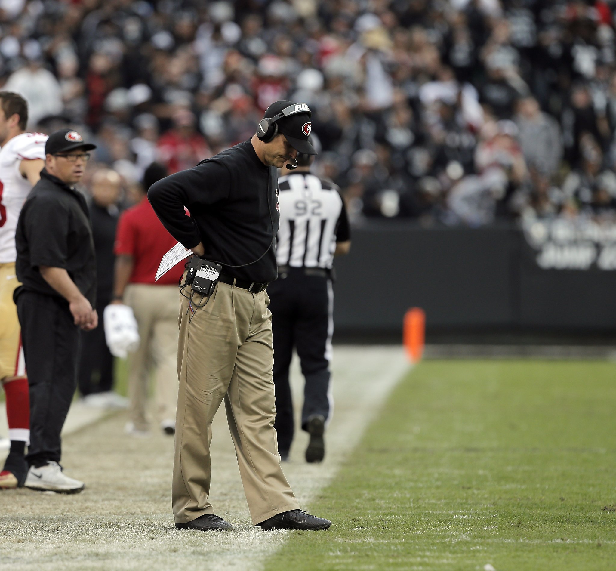 Beleaguered Jim Harbaugh still standing day after loss to Raiders