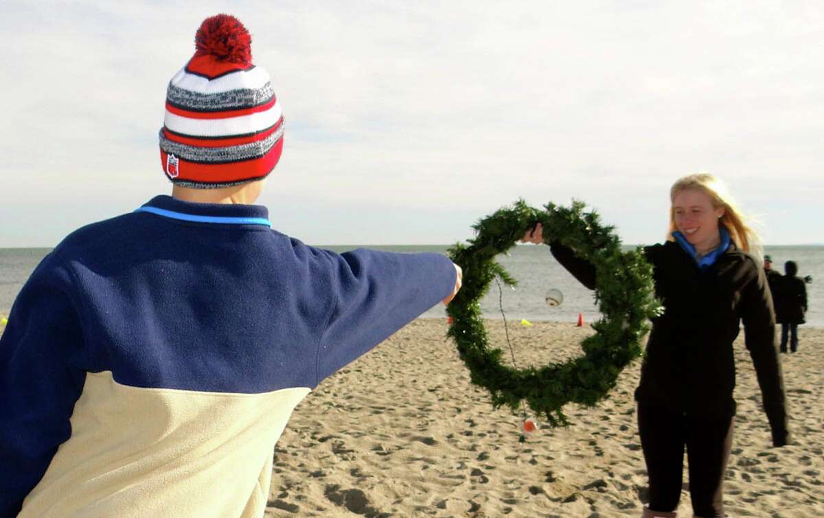 'Freezin' for a Reason' Crowd takes a plunge to raise cold cash for