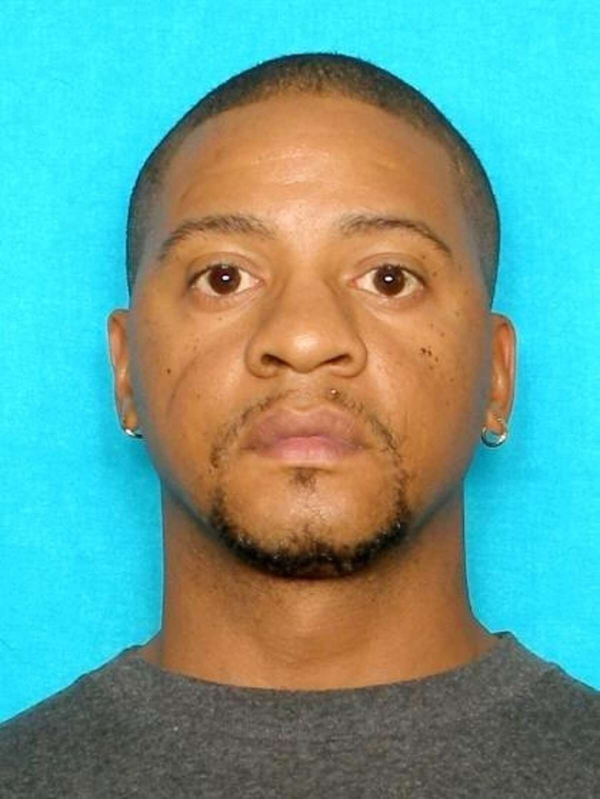 Christopher Bernard Doss, 41, is wanted on capital murder charges after gunning two people down Sunday on the West Side, according to police.