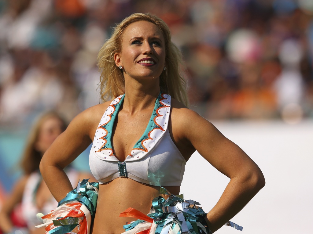 Houston Texans cheerleaders adorn their pink outfits as October is