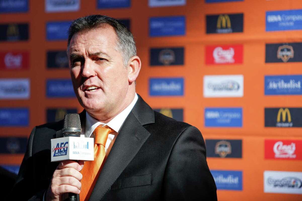 The Dynamo introduce new coach Owen Coyle at a news conference at BBVA Compass Stadium, Tuesday, Dec. 9, 2014 in Houston.