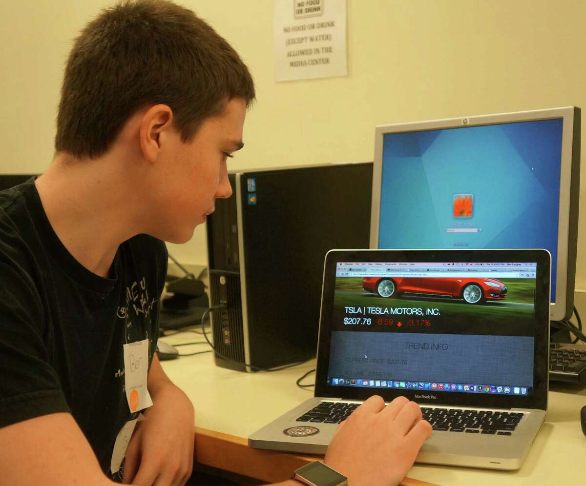 Greenwich High School senior Ben Langley, in his second year studying computer programming at the high school, shows a profile page he made for Tesla Motors.