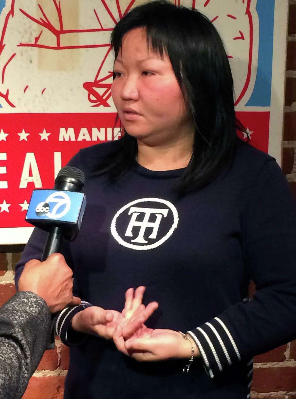 Huan Kuang addresses the media during a press conference on December 9, 2014 in San Francisco, California, regarding the sentencing the Uber driver who struck Kuang and her two children, killing her six-year-old daughter, Sofia Liu. The driver, Syed Muzaffar, 57, of Union City, is charged with misdemeanor vehicular manslaughter in connection with the crash.