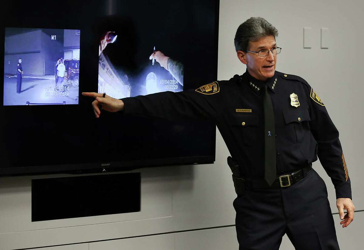 San Antonio Police Chief William McManus shows the different perspective from a car camera and a body camera as he presents his pitch to members of city counsel for purchasing body cams to be used by certain police officers. Wednesday, Dec. 10, 2014.