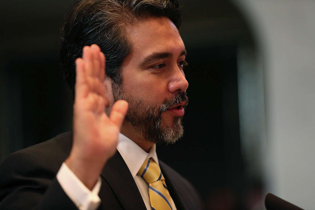 Roberto Trevino, a 43-year-old architect, takes the oath of office after the San Antonio City Council selects him to fill Diego Bernal's seat for District 1 during a meeting, Thursday, Dec. 11, 2014. Bernal resigned to seek the State Representative District 123 held by Mike Villarreal who resigned to run for mayor.