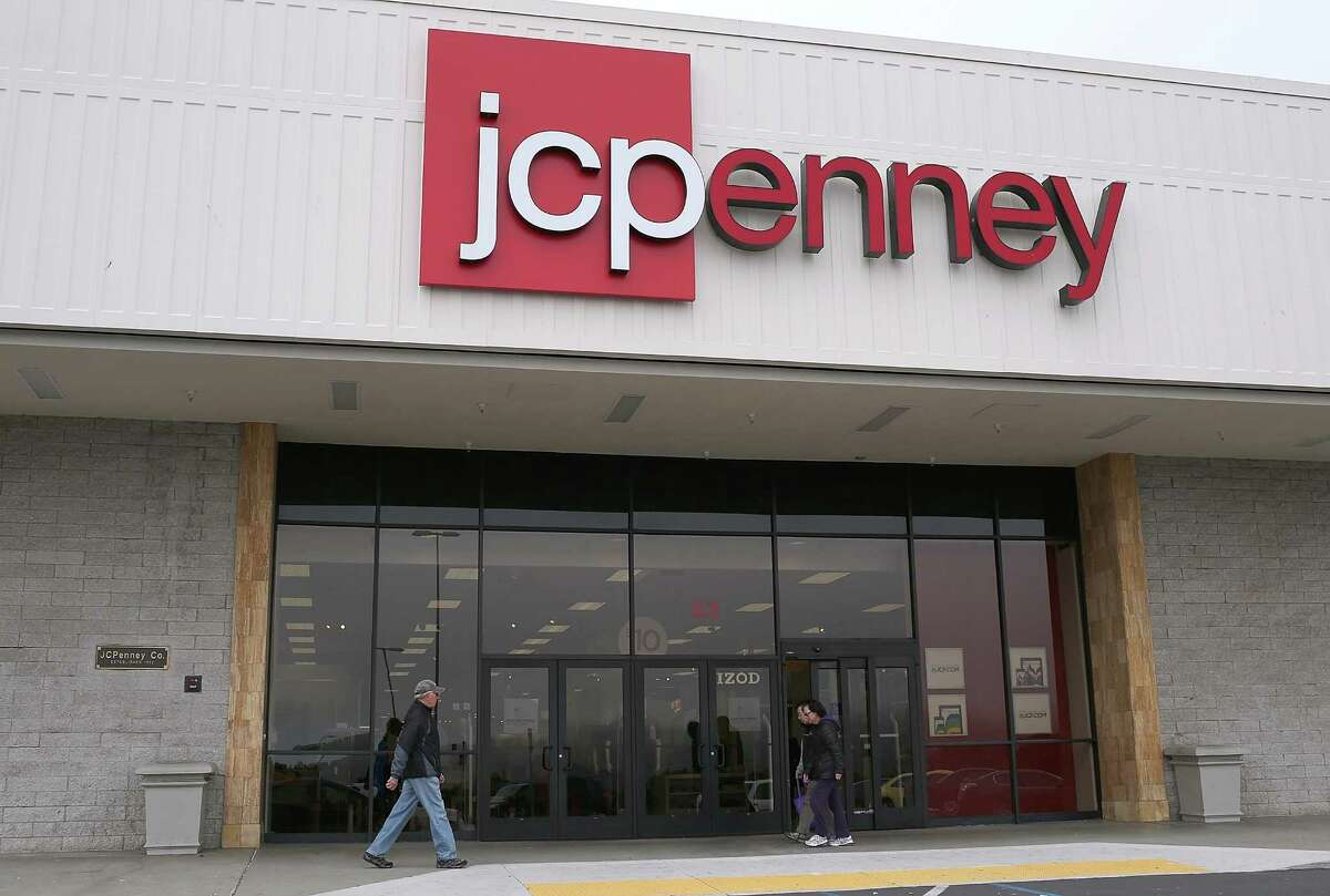 FILE - APRIL 8, 2013: It was reported JC Penney CEO Ron Johnson has stepped down and Mike Ullman will rejoin the company as CEO April 8, 2013. DALY CITY, CA - FEBRUARY 28: People walk by a JCPenney store on February 28, 2013 in Daly City, California. J.C. Penney Co. reported a 31.7 percent drop in fourth quarter earnings with a net loss of $552 million, or $2.51 per share compared with a loss of $87 million, or $0.41 one year ago.